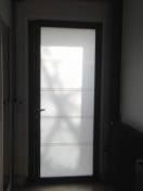 Portes d'entrée en aluminium : porte d'entrée k-line symphonie vue d'intérieur, vitrée. Wilco Yvelines 78