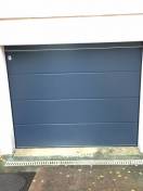 Portes de garage sectionnelles : porte de garage sectionnelle bleue teckentrup sans rainure type gsw40. Wilco Yvelines 78
