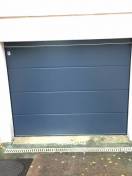 porte de garage sectionnelle bleue TECKENTRUP sans rainure type GSW40