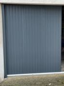 Portails et clotures alu : porte de garage automatique coulissante sib pleine grise, plein. Wilco Yvelines 78