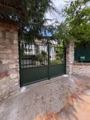 Portail en aluminium vert installé à Vernouillet